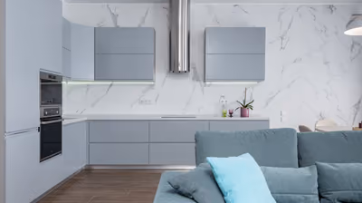 Luxury kitchen with marble surfaces, premium cabinetry, and high-end finishes