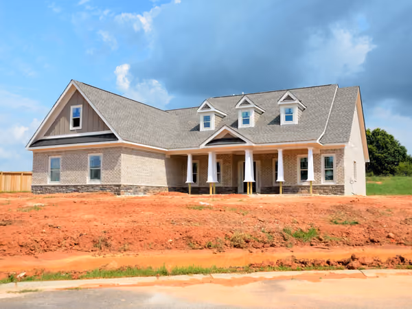 Newly built custom home with a covered front porch